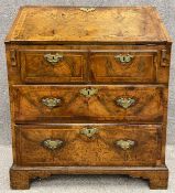 A Georgian burr walnut bureau of small size with crossbanding and featherbanded inlay, and with