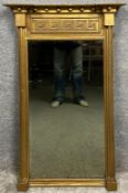 A Regency neoclassical giltwood pier mirror with a breakfront cornice above a key fret decorated