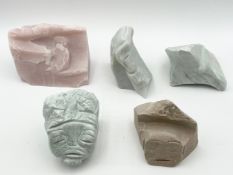 A collection of five abstract soapstone sculptures. H.12 W.18 D.10cm (largest).