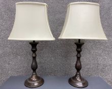 A pair of contemporary brass table lamps with shades. H.57cm.
