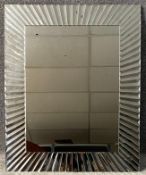 A contemporary John Lewis mirror in a mirrored frame. H.82 W.66cm