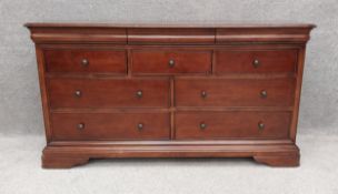 A contemporary cherrywood sideboard. H.86 W.161 D.50cm
