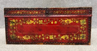 A 19th century hand painted and studded travelling trunk. H.35 W.80 D.51cm.