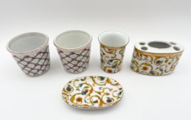 A pair of hand painted Dresden porcelain vases with rose heads and a foliate design by Carl