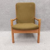 A mid century birch framed Ercol model 749 armchair. H.92cm