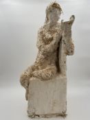 Jocelyne Blair, a mixed media figure of a seated woman reading. H.61 W.25 D.22cm.