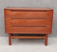 Nils Jonsson for HJN Mobler, a mid century Danish teak dressing chest with rising lid opening to