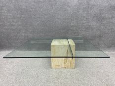 An Italian mid-century Artedi travertine stone and chrome coffee table with a glass top. H.38 W.
