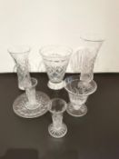 A collection of Stuart cut crystal to include six vases and a coaster. Tallest H.25.5cm