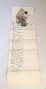A late 18th or early 19th century hand written Ottoman firman on paper, highly decorated in red