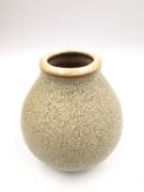 A salt-glazed studio pottery vase of globular form with a slightly flared rim, with makers marks