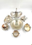 A collection of silver plate to include a Mappin and Webb footed dish with swing handle, a footed