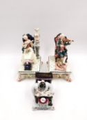 A Royal Dux porcelain figure group depicting an 18th century gentleman playing the violin with a dog