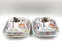 A pair of early 19th century Masons Ironstone covered tureens, hand painted with the Flying Bird