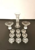 A collection of cut glass to include nine open salt cellars, two etched, footed glasses with foliate