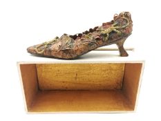 A papier-mâché model shoe with applied lizard and leaves decoration, in a wooden presentation box,