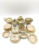 A Wedgwood drab ware child's miniature part dinner/tea service to include, two lidded tureens and