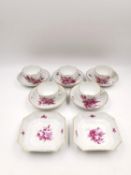 A set of five coffee cups and saucers and two bon bon dishes with pink floral sprigs, possibly