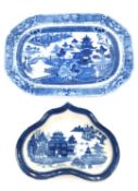 A 19th century willow pattern platter, along with another transferware dish, probably Spode. L.39.