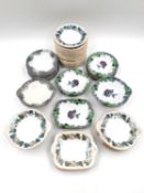 A matched collection of 19th century Davenport miniatures comprising mostly plates, bowls, platters,