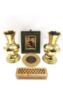 A mixed lot to include a bronze relief depicting three seated children in a brass frame, a stoned