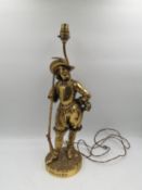 A brass figural lamp of a Cavalier, after the original bronze titled 'Rolando' by Edmond Leveque.