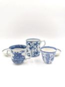 A collection of blue and white porcelain with Oriental motifs to include a mug, a twin handled