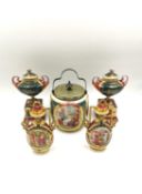 Two pairs of late 19th/early 20th century Royal Vienna lidded urns and a biscuit barrel depicting