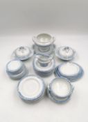 A child's miniature part dinner service to include a tureen, a serving bowl on stand, two lidded