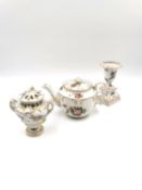 A small collection of miniature hand painted and gilt porcelain to include a teapot, a lidded