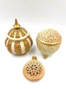A collection of three 19th century Royal Worcester lidded and reticulated ivory blush potpourri. All