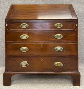 A Georgian mahogany bureau with a fitted interior. H.107 W.91.5 D.52cm.