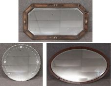A miscellaneous collection of three mid century wall mirrors. H.51 W.82 D.2cm plus Dia.61cm plus H.