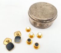 A Tiffany and Co. sterling silver box with marks, along with three sets of yellow metal cufflinks.
