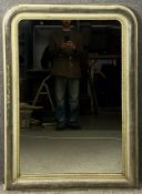 A 19th century French painted and silver gilt overmantel mirror with beadwork detailing and an