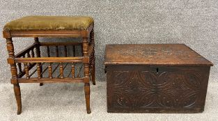 A 19th century mahogany Aesthetic style piano stool with original upholstery on turned supports,