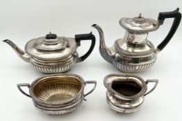 A matched silver plated tea and coffee service to include a twin handled sugar pot and a creamer