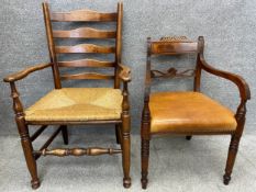 A 19th century elm and rush ladderback carver chair, along with a contemporary Regency elbow chair