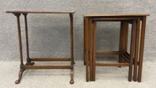 A Georgian style walnut and crossbanded lamp table along with a mid century mahogany nest of tables.