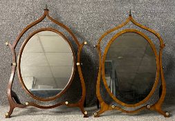 A near pair of 19th century mahogany toilet mirrors in skeleton frames withe brass finials and