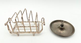 An early 20th century Atkins Brothers silver hallmarked toast rack, along with a pewter jewellery