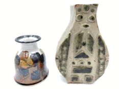 Two studio pottery vases, one slab-built with applied abstract decoration, the other thrown with