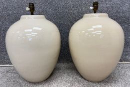 A pair of contemporary crackle glazed ceramic table lamps of globular form. H.45cm.