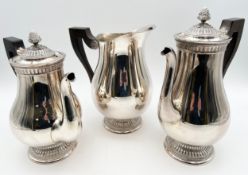 A Christofle 'Malmaison' silver plated three piece coffee service. H.24cm (largest).