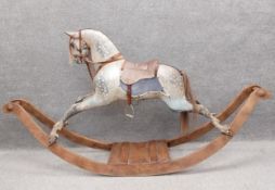 A C.1900 F.H. Ayres plane carved rocking horse painted in white with
