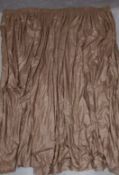 A pinch-pleat hessian backed bronze coloured cotton curtain. H.270 W.190cm