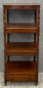 A 19th century mahogany four tier whatnot fitted with base drawer. H.119cm