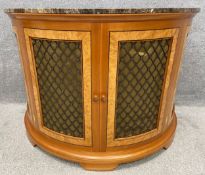 A contemporary walnut and birdseye maple demi-lune console table or radiator cabinet with metal