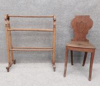 A Victorian oak shield-back hall chair with a shaped splat on square tapering supports, along with a