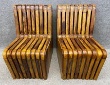 A pair of mid-century Italian bent olivewood chairs from a station waiting room in Bologna. H.86cm.